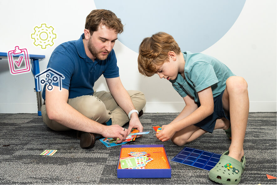A father and son playing a board game